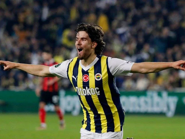 Fenerbahce's Ferdi Kadioglu celebrates scoring their first goal on December 14, 2023