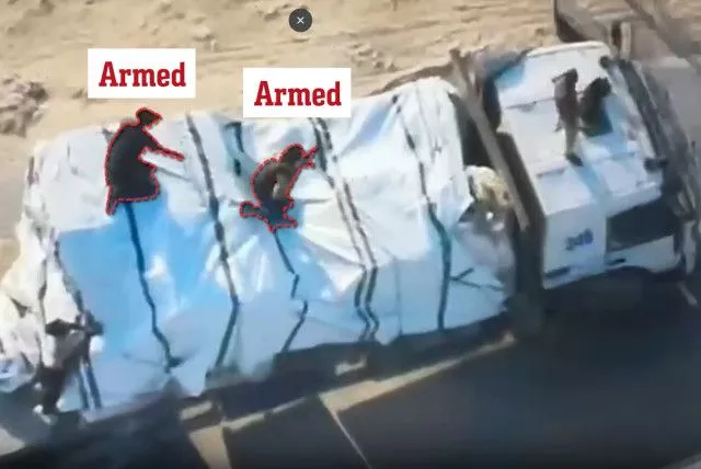  Armed terrorists attempt to loot an aid truck in Gaza, September 21, 2024. (credit: IDF SPOKESPERSON'S UNIT)