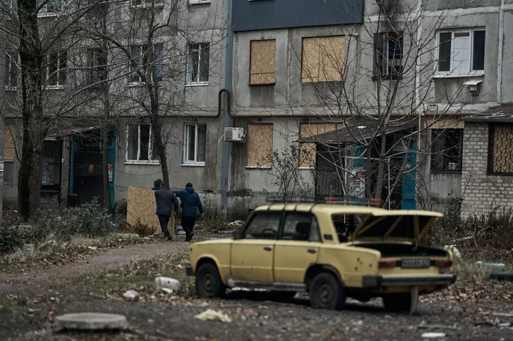 Workers replace broken windows after a Russian rocket attack in Pokrovsk, Ukraine