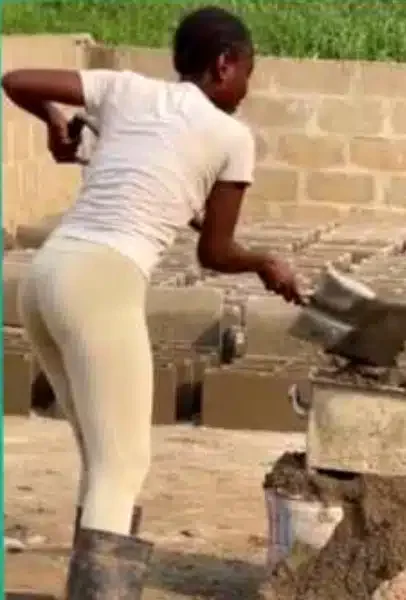 'Who's she, I want to marry her' - Lady seen in video molding blocks gets applauds online