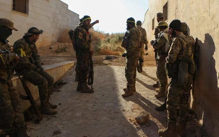 Fighters prepare for the next battle in Atareb