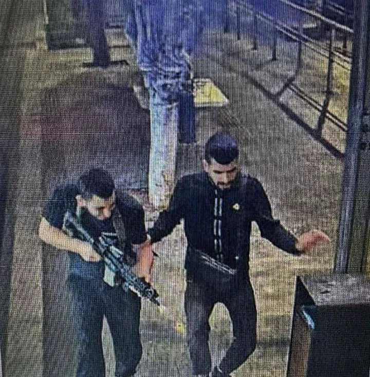 Two suspects were seen with assault rifles shooting at innocent people