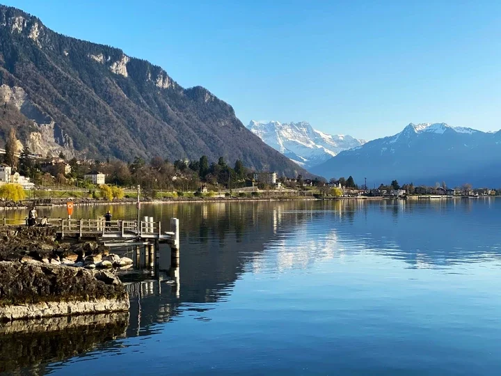 Image may contain Nature Outdoors Scenery Landscape Lake Water Lakefront and Person