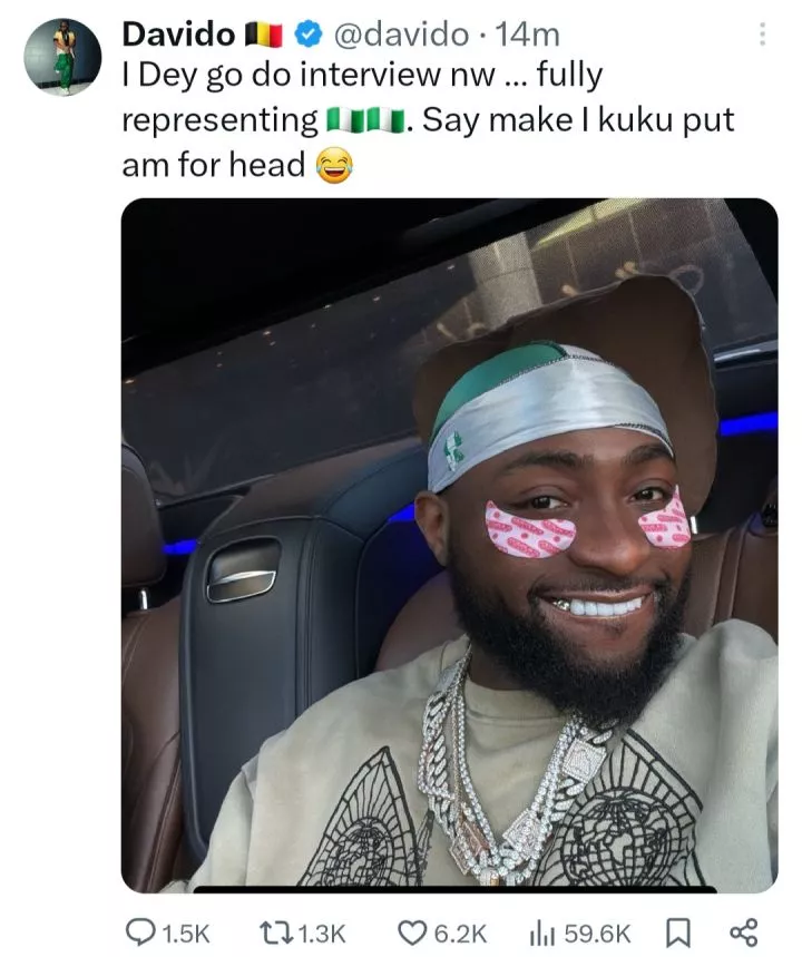 Davido wears Nigerian flag on his head to interview after receiving heat for speaking about the poor state of Nigeria