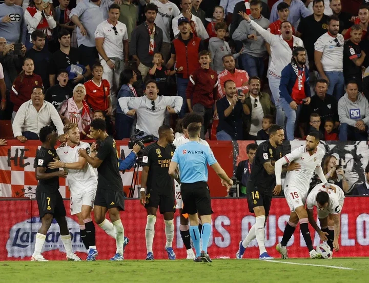 Racist insults and throwing an object that looks like a banana at Vinicius from the stands: F***ing monkey, f***ing monkey