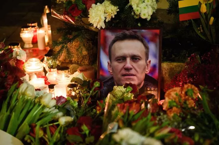 Russia begins jailing hundreds of protesters for laying flowers and candles in memory of dead Putin critic, Alexei Navalny