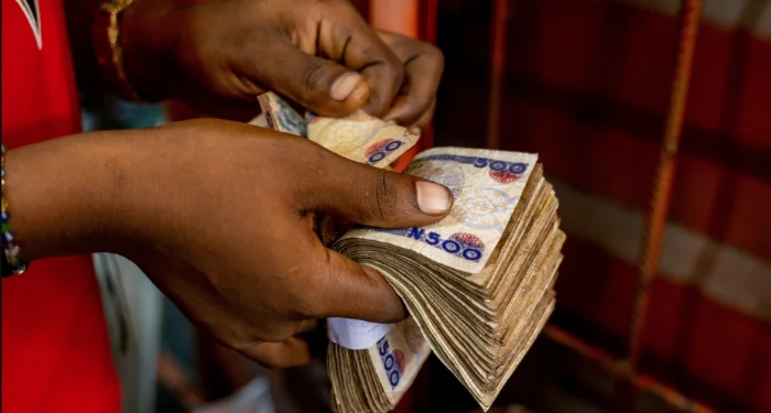 Currency outside banks surges as Nigerians keep 94% as cash in hand - March 2024 report