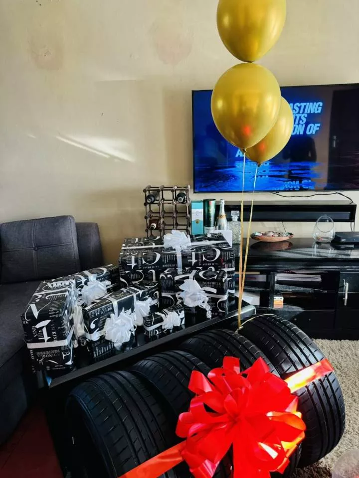 Girlfriend raises the bar high as she flaunts the gifts she got for her boyfriend on his birthday