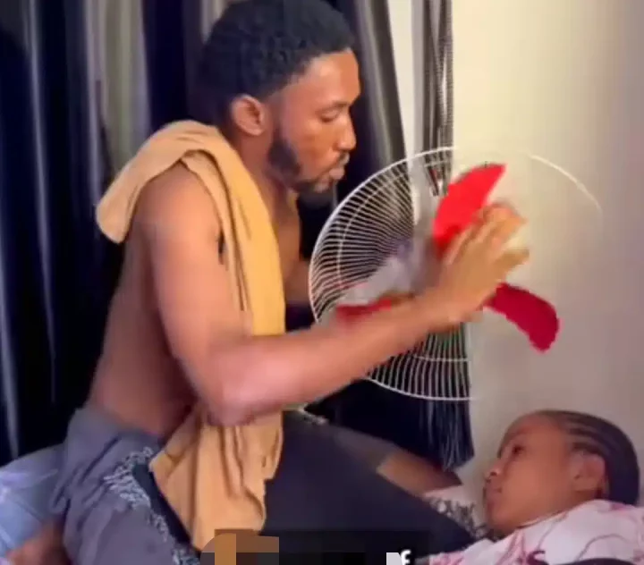 'Understanding boyfriend' - Man raises the bar for Nigerian men as he fans sleeping girlfriend, wows many