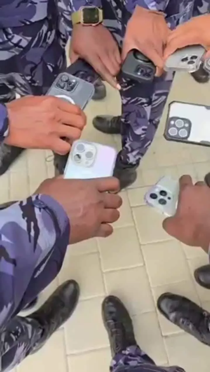 'Which work them dey do' - Reactions as a group of Nigerian police officers flaunt their iPhones