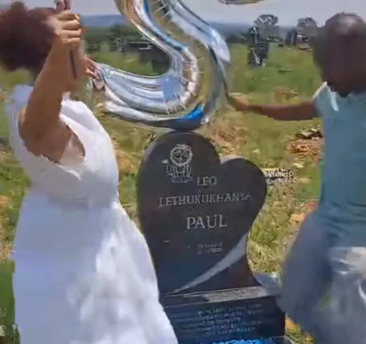 '‎I'd forever cry' - Parents sing, dance as they visit late son's burial ground with balloons to celebrate his 2nd birthday