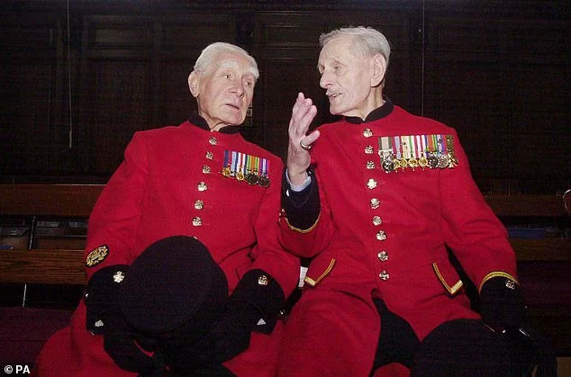 Charlie Hackney (right), then 87, seen with fellow veteran Bill Germanes in 2004, when the pair were Chelsea Pensioners