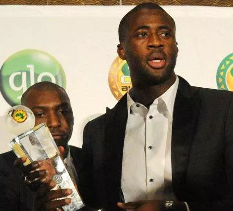 Yaya Toure with the 2013 Africa Player of the Year award - The Nation Newspaper