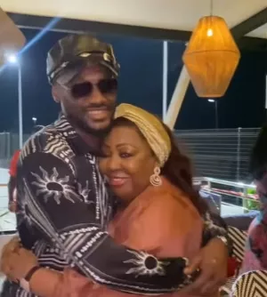 Tongues wag as Senator Florence Ita Giwa hugs 2Face at an event