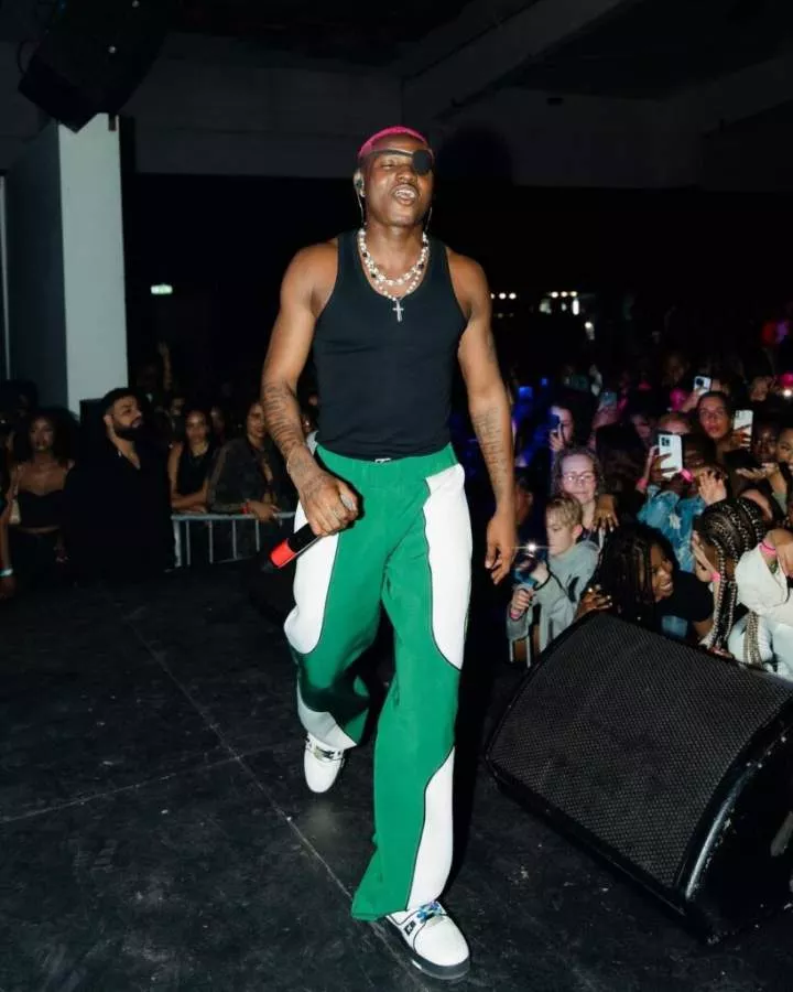 'He needs to slow down' - Netizens react to trending video of singer, Ruger rocking numerous ladies at his concert in Canada