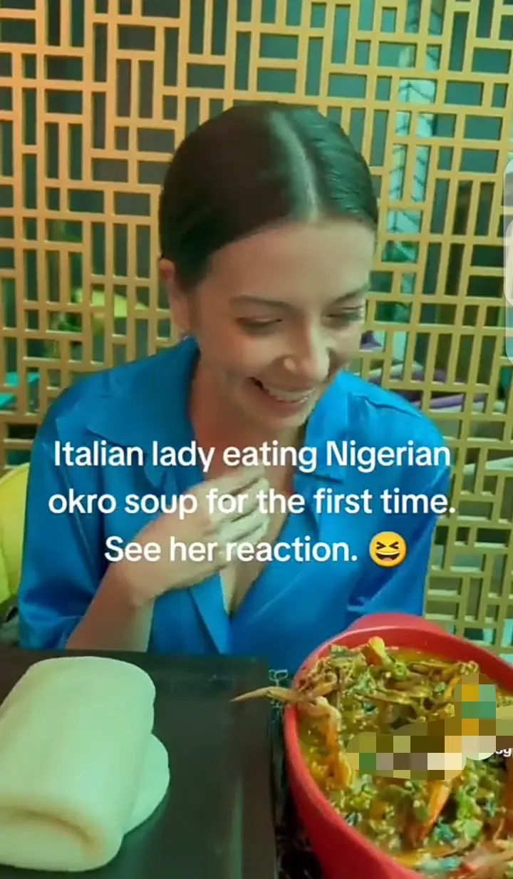 Italian lady stirs reaction as she tastes Nigerian Okra soup for the first time (video)