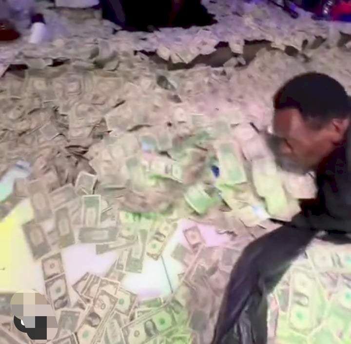 Tunde Ednut contemplates becoming a stripper as he drools over pile of cash made by strippers at party (Video)