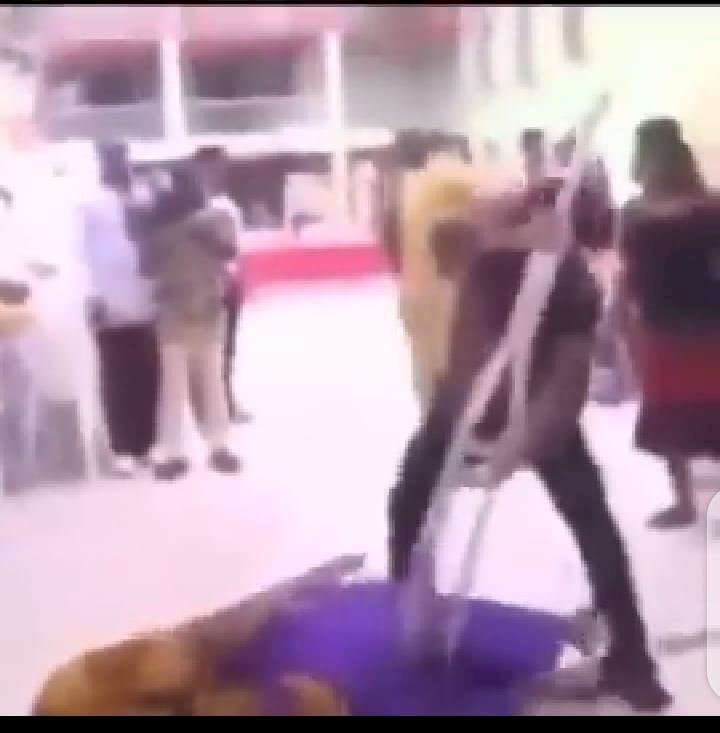 Prophet Odumeje performs a weird miracle on an old woman with crutches (video)