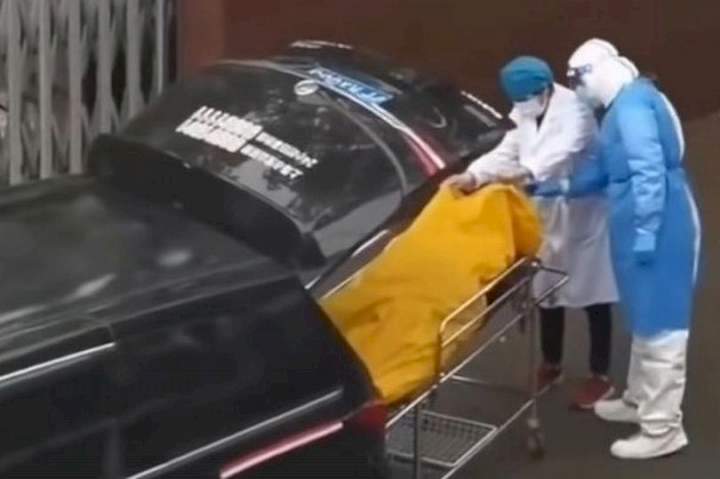 Covid patient in a body bag comes back to life just before being cremated after 'dying'