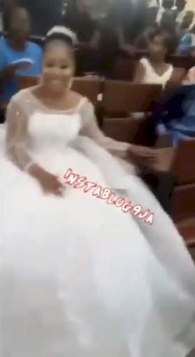 University of Abuja student makes grand entrance into exam hall in wedding dress (Video)