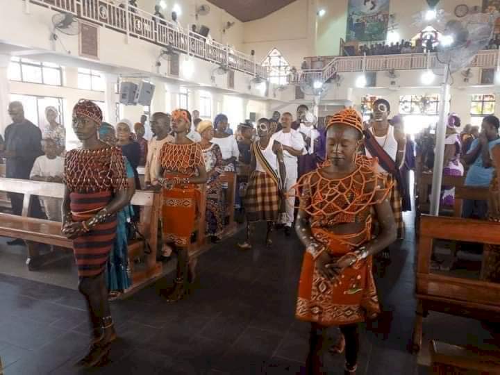 Reactions pour in as photos from a Catholic church in Abuja celebrating mass using African cultural items surface online