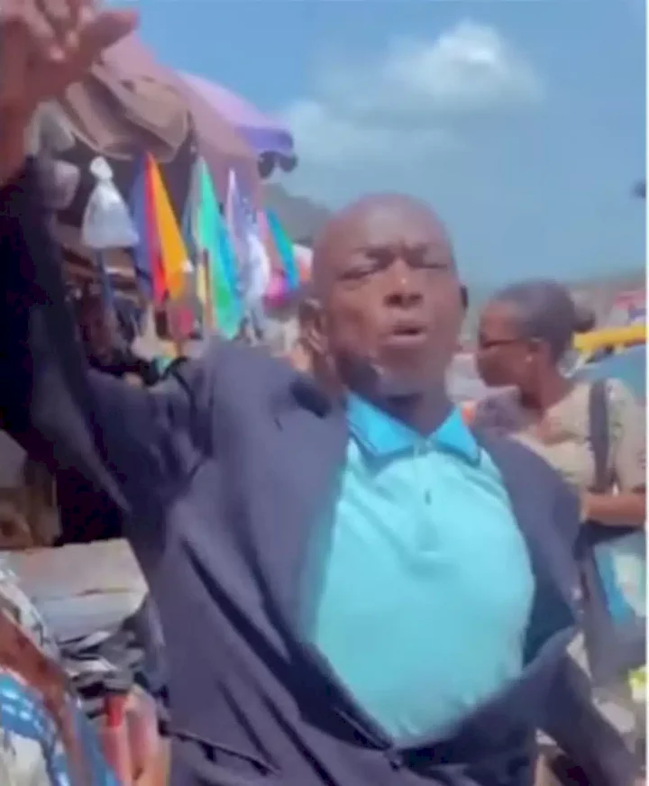 Market trader confronts preacher for calling women unprinted names while preaching (Video)