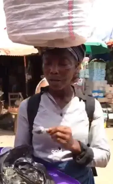 Lady causes buzz online as she markets 'Ogiri' locust beans with queen's English in Lagos