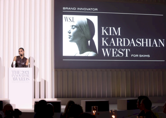 Kim Kardashian suffers 'fashion emergency' as her tight dress unzips at awards show