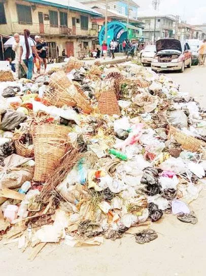 Residents Lament Refuse Dumps, Potholes On Owerri- Onitsha Road