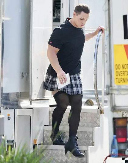 John Cena rocks mini skirt and high heels