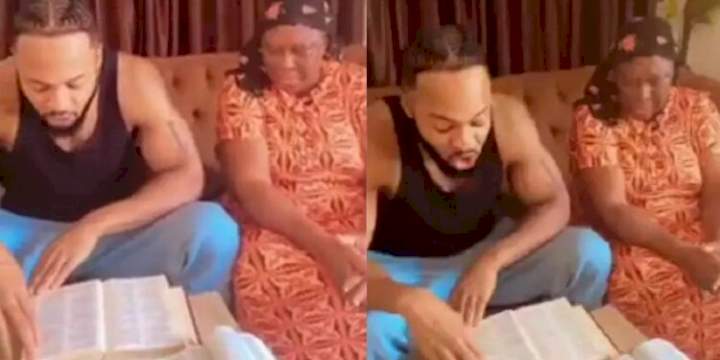 Singer, Flavour warms hearts with video of him reading Bible verse to his mum during devotion (Watch)