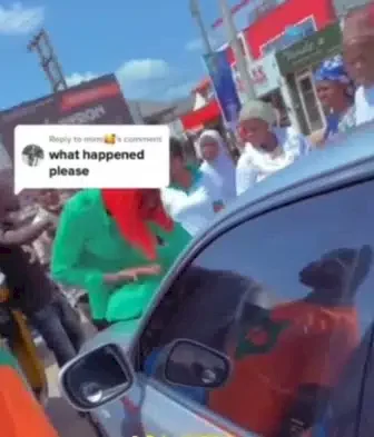 Lady makes a scene to prevent husband from zooming off with their kids after dumping her (Video)