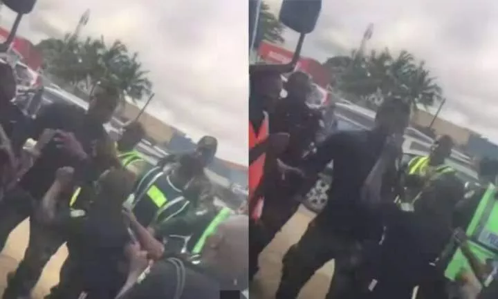 Reactions as tall soldier and short policeman fight in public (Video)