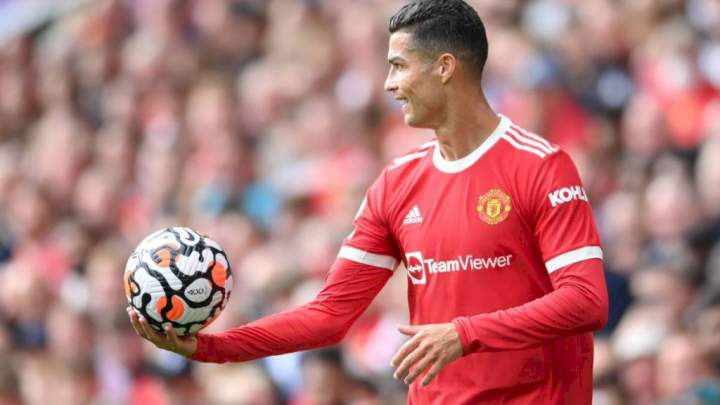 EPL: Ronaldo reacts as his brace takes Man Utd top of table