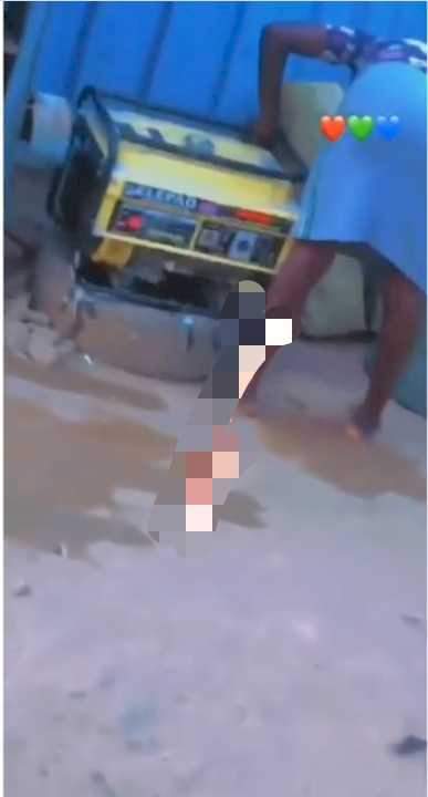 "Na her own motor be that" - Reactions as lady is spotted in Ibadan giving her generator a soap and water bath (Video)