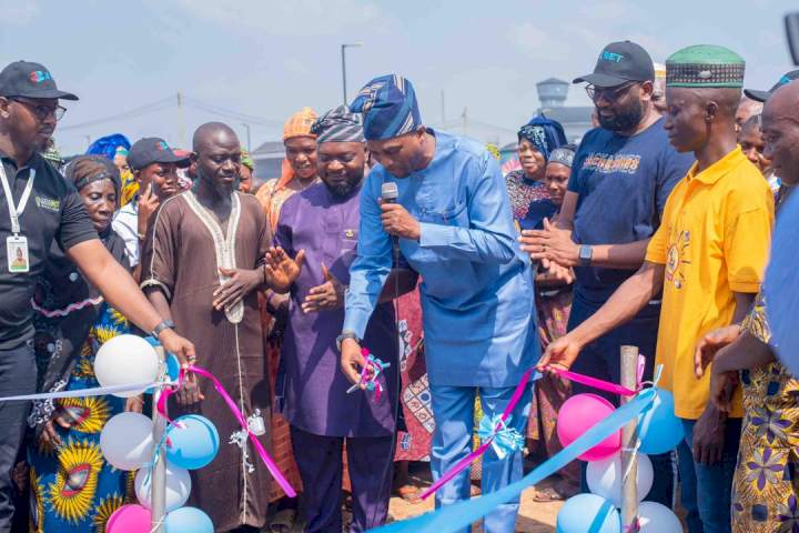 Cutting of the ribbon  at Ojoo Meat Marketby the DG Oyo State Gaming Board with key stakeholders
