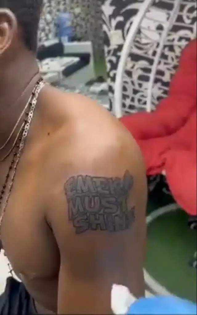 Blaqbonez reacts as diehard fan tattoos name of his new album on his body