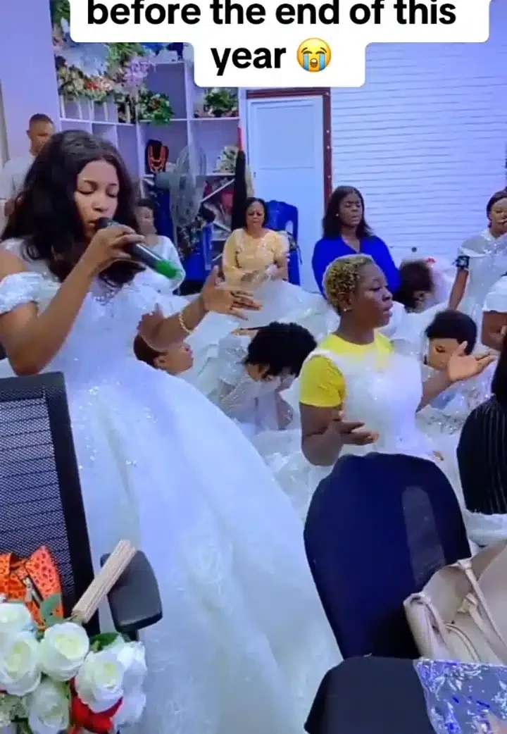 Single ladies wear wedding gowns to church as they hold wedding retreat to pray for husbands (Video)