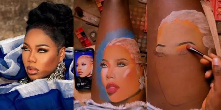 Artist uses makeup to paint image of Toyin Lawani on her lap, she reacts