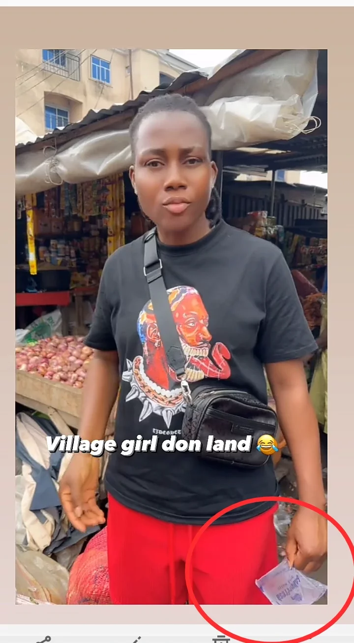 Super Falcons and goalkeeper, Nnadozie spotted with sachet water while in a local market in Nigeria.