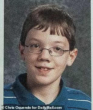 Crooks in his middle school yearbook picture from 2016