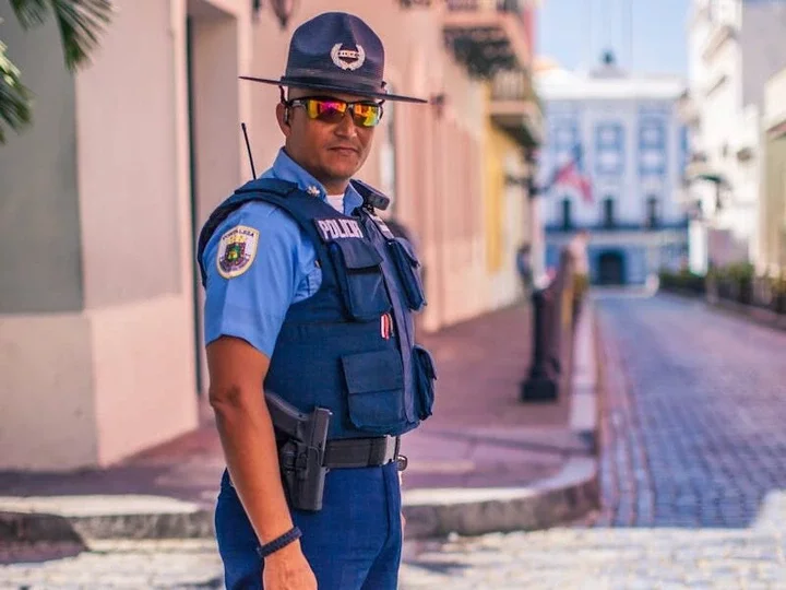 Standing Man In Uniform Wearing Bulletproof Vest