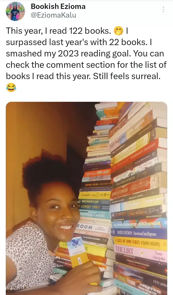 Lady flaunts gigantic stacks of books she read in 2023