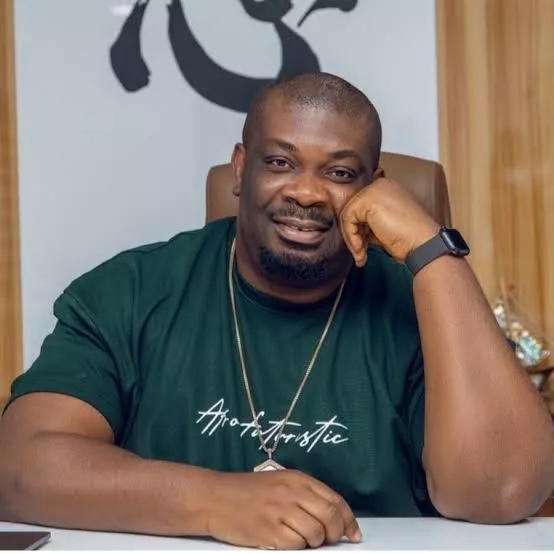 Lady sheds tears of joy as Don Jazzy gifts her N5M to buy car for children's school runs