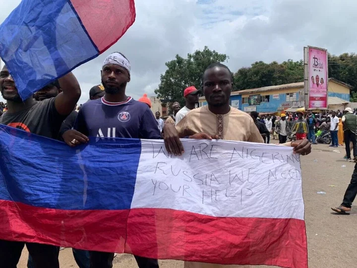 #EndBadGovernance Protesters Call for Help as Russian, Japanese Flags Spotted in Jos (Pictures)