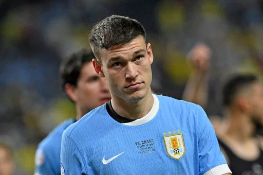 Uruguay's midfielder #05 Manuel Ugarte looks on following his team's victory in the Conmebol 2024 Copa America tournament quarter-final football match between Uruguay and Brazil at Allegiant Stadium in Las Vegas, Nevada on July 6, 2024. (Photo by Robyn BECK / AFP) (Photo by ROBYN BECK/AFP via Getty Images)