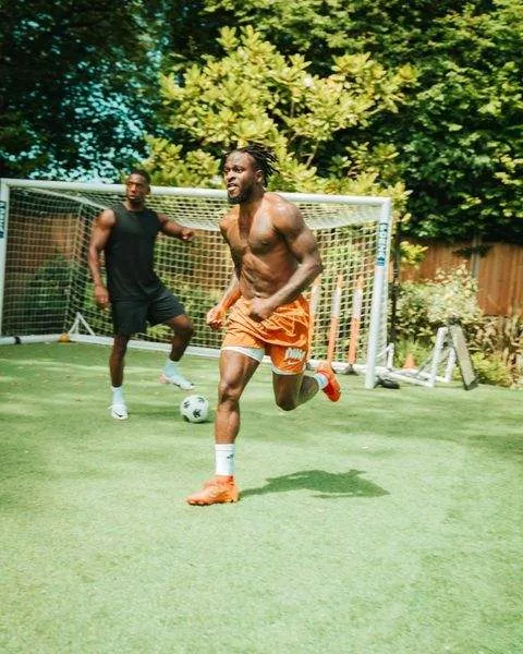 Victor Moses with his friends enjoying a kick about.