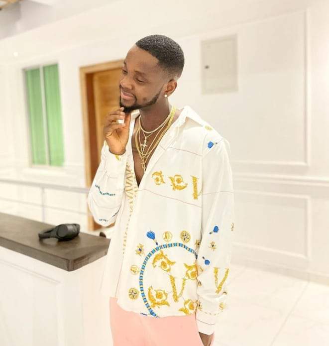 Kizz Daniel replies lady who asked him for N100k to prove he isn't stingy