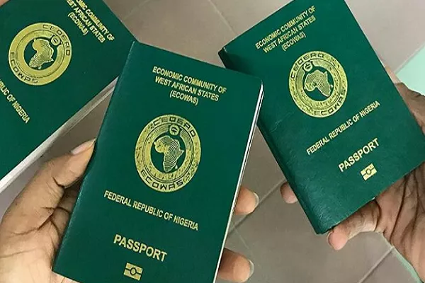 Nigerians reacts as President Tinubu's aide, Segun Dada, claims Immigration Service has cleared 204,332 passport backlogs