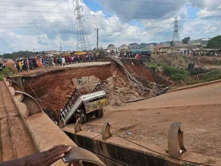 Mixed Reactions as Link Bridge Collapses, Traps Car in Enugu (Photos)